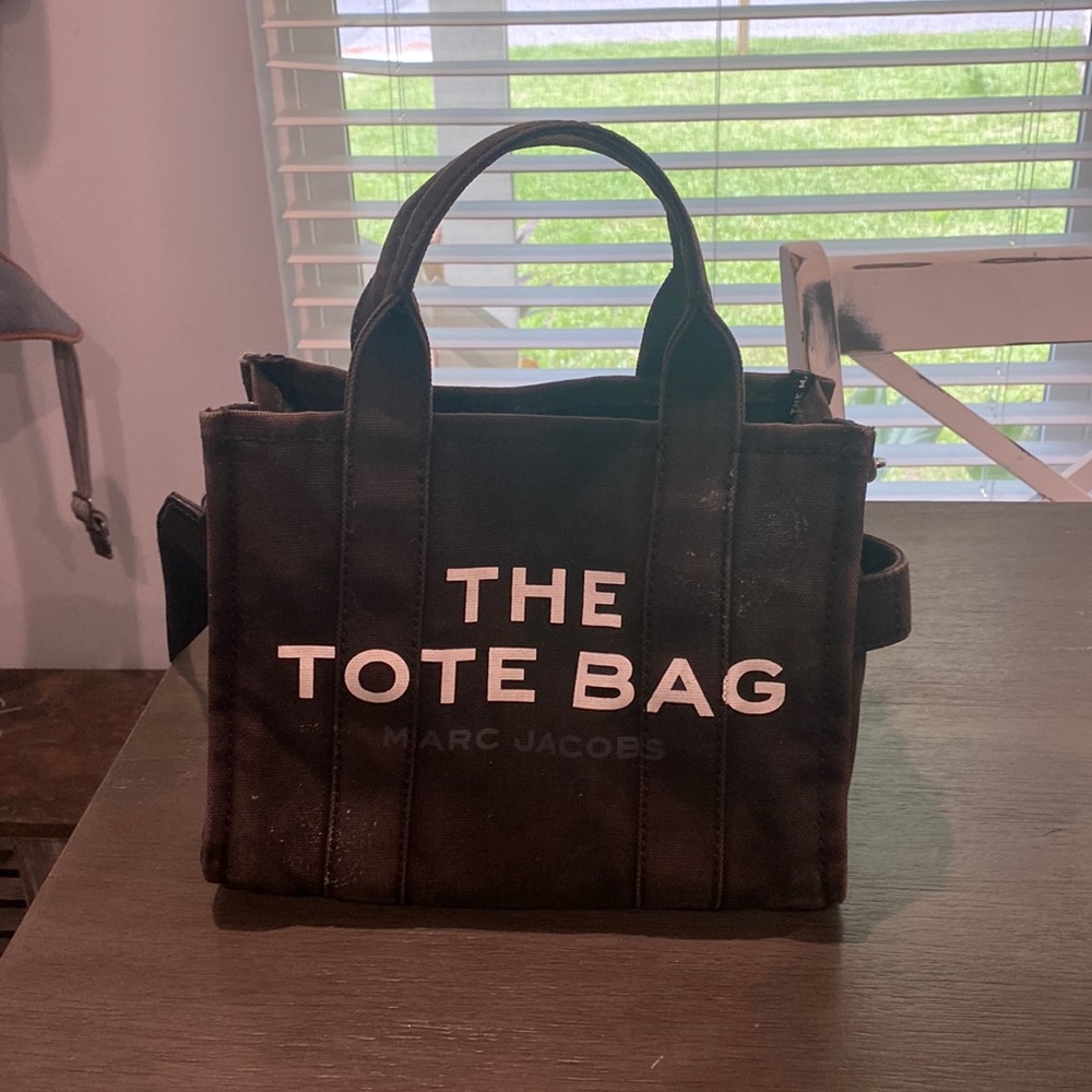 Marc jacobs mini tote bag. Color is a dark brown almost black.